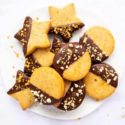 overhead photo of peanut butter shortbread cookies on white plate