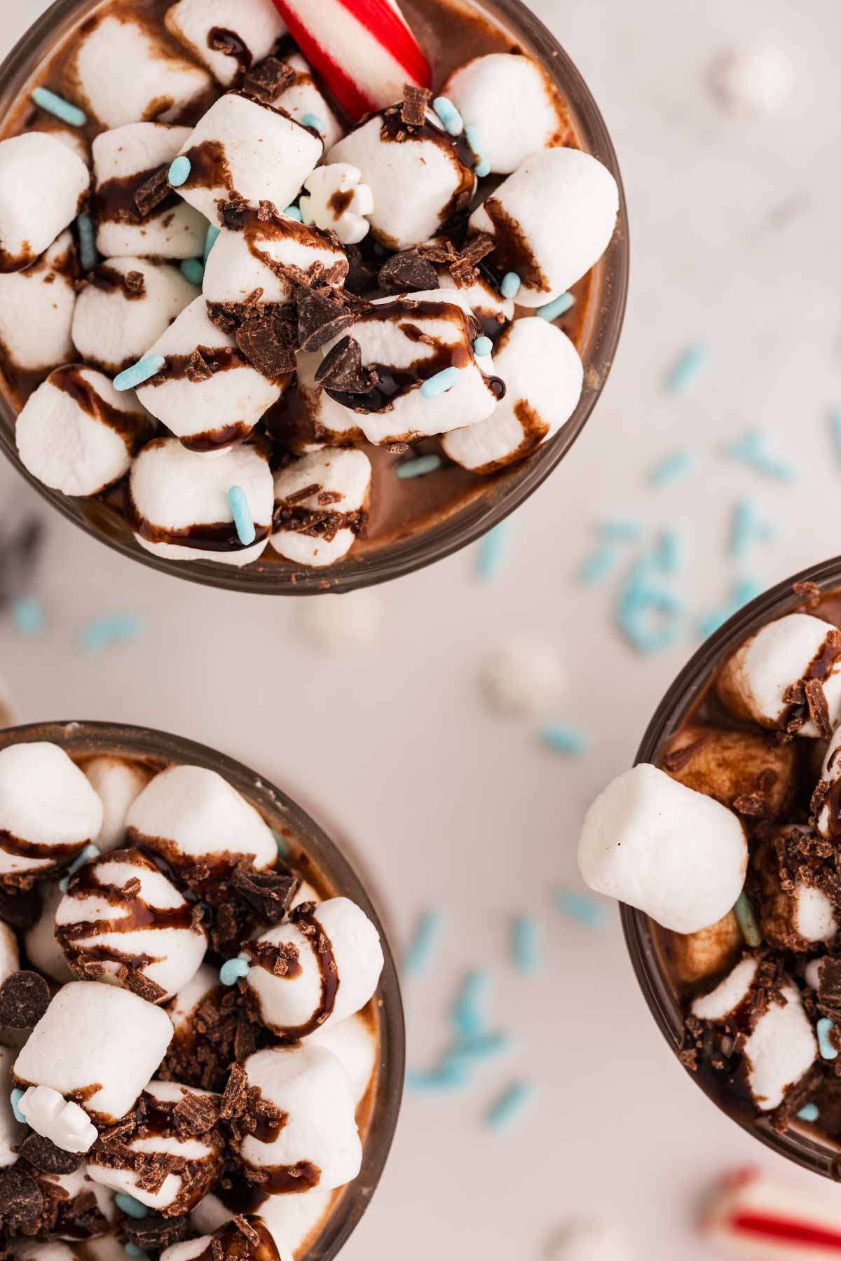 overhead view of three mugs of hot chocolate