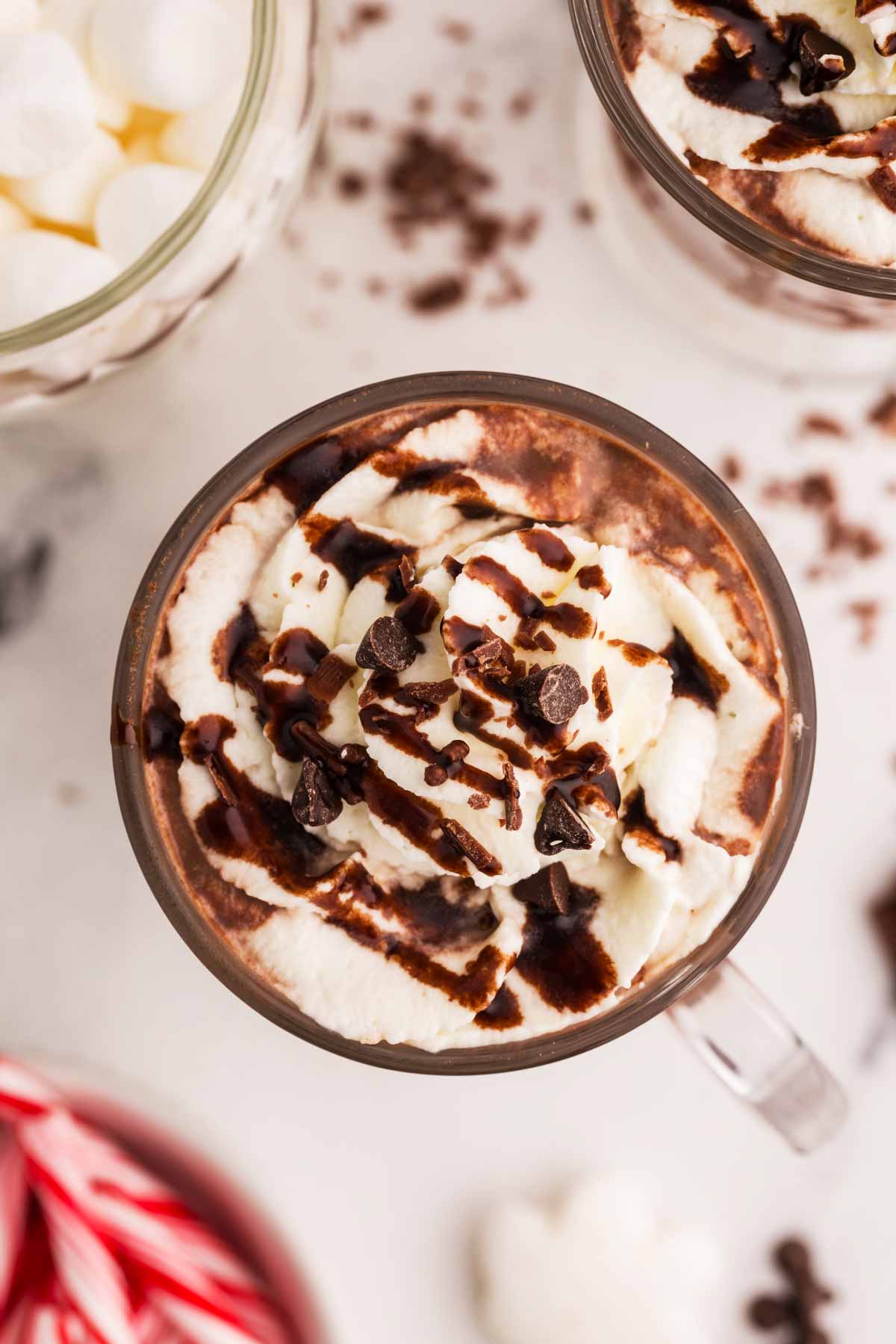 overhead view of photo chocolate with whipped cream and chocolate shavings