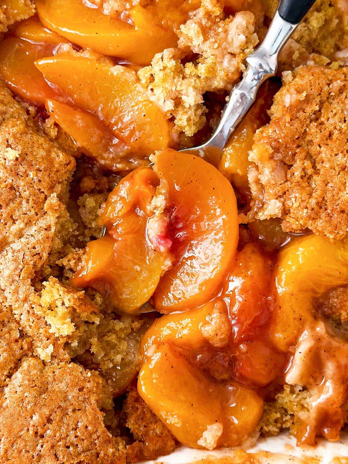 overhead close up view of peach cobbler
