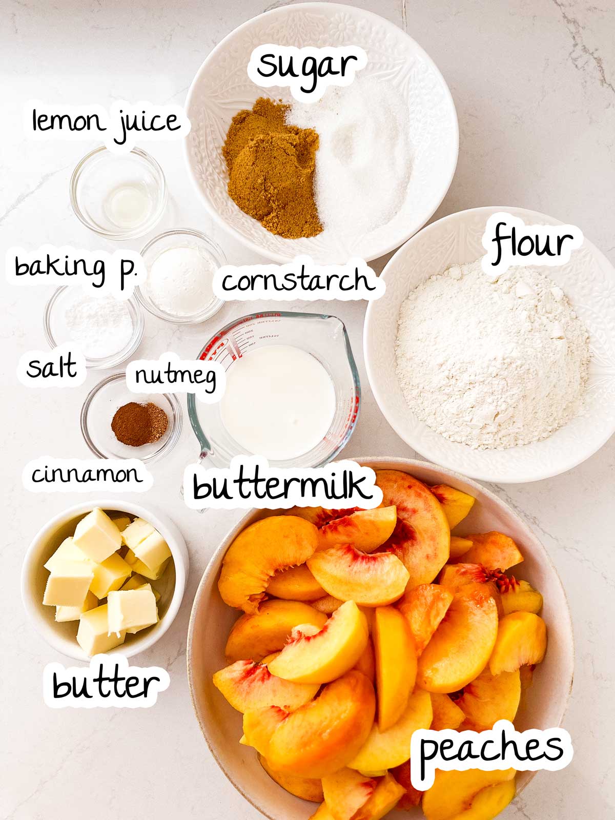 overhead view of ingredients for peach cobbler with text labels