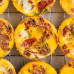 overhead view of several egg bites on cooling rack