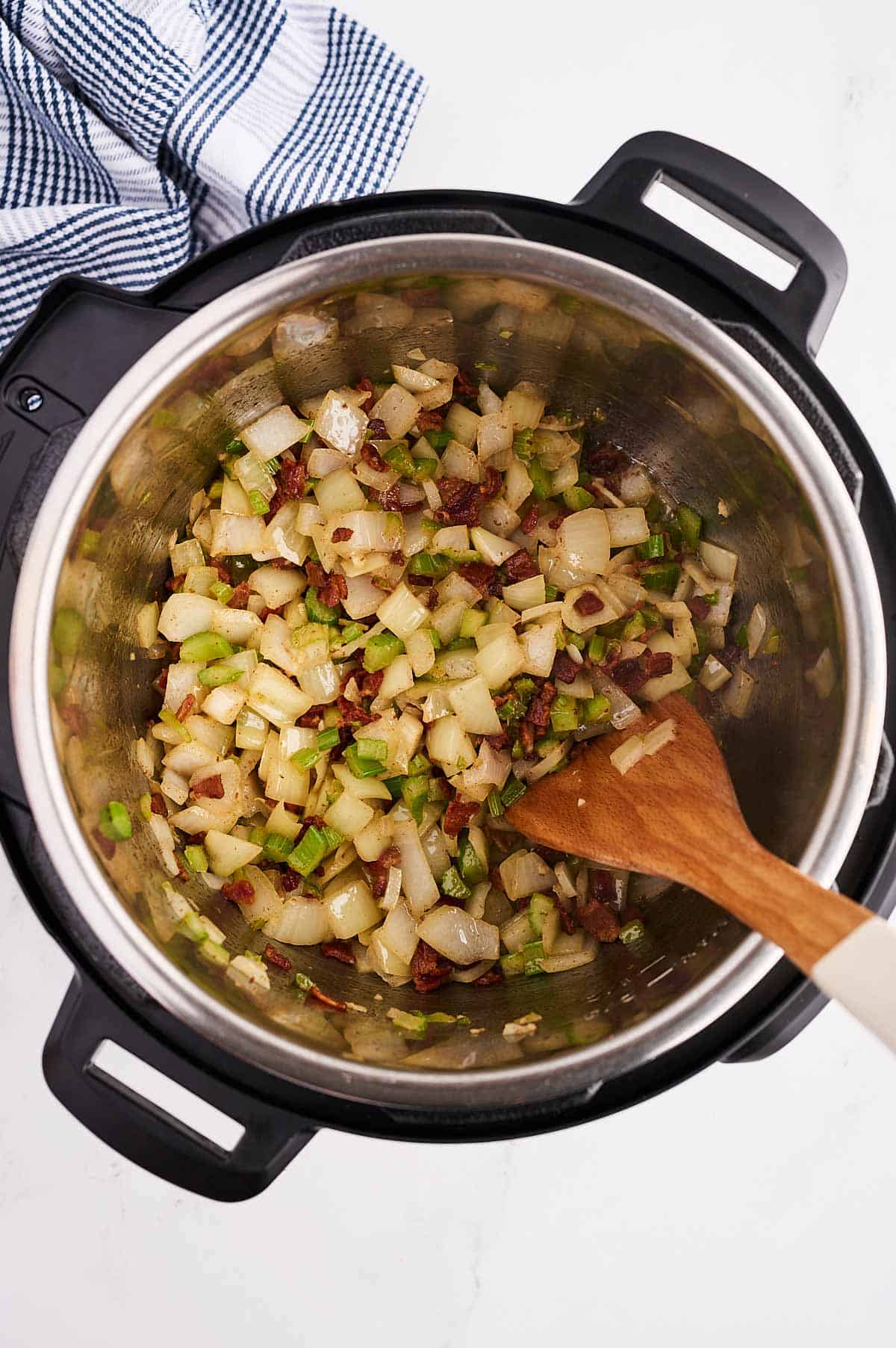 overhead view of cooked aromatic vegetables in instant pot