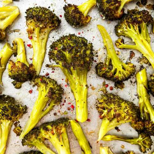 overhead view of roasted broccoli on sheet pan