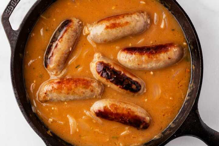 sausages in onion gravy before serving