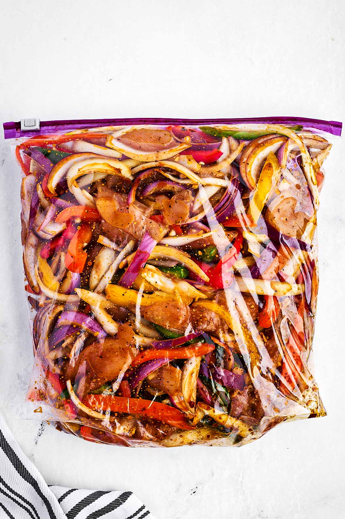 overhead view of chicken fajita mix in zip top bag