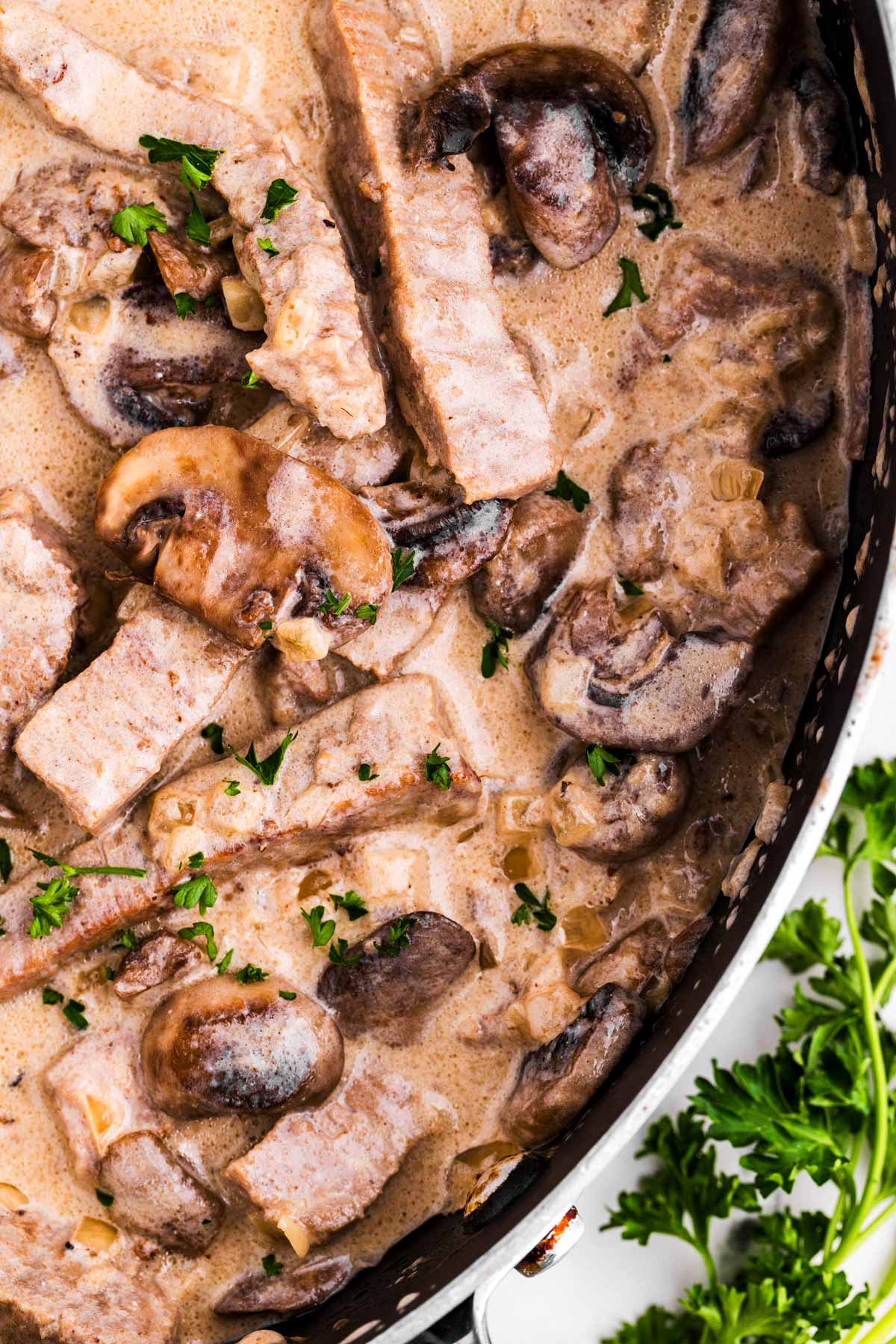 overhead close up view of beef stroganoff in skillet