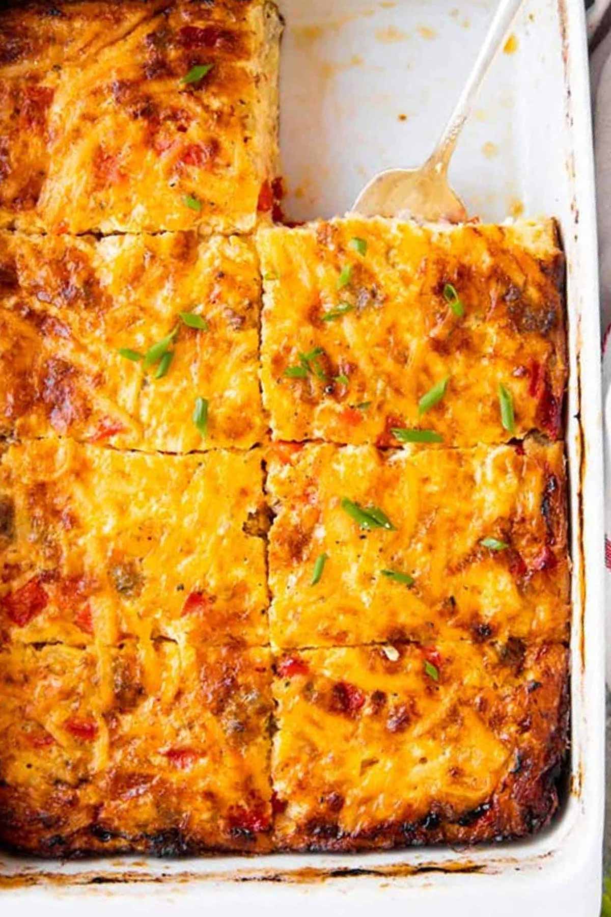 overhead close up view of hashbrown breakfast casserole cut into slices