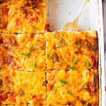 overhead close up view of hashbrown breakfast casserole cut into slices