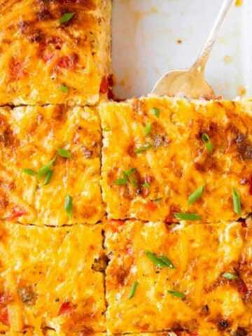 overhead close up view of hashbrown breakfast casserole cut into slices