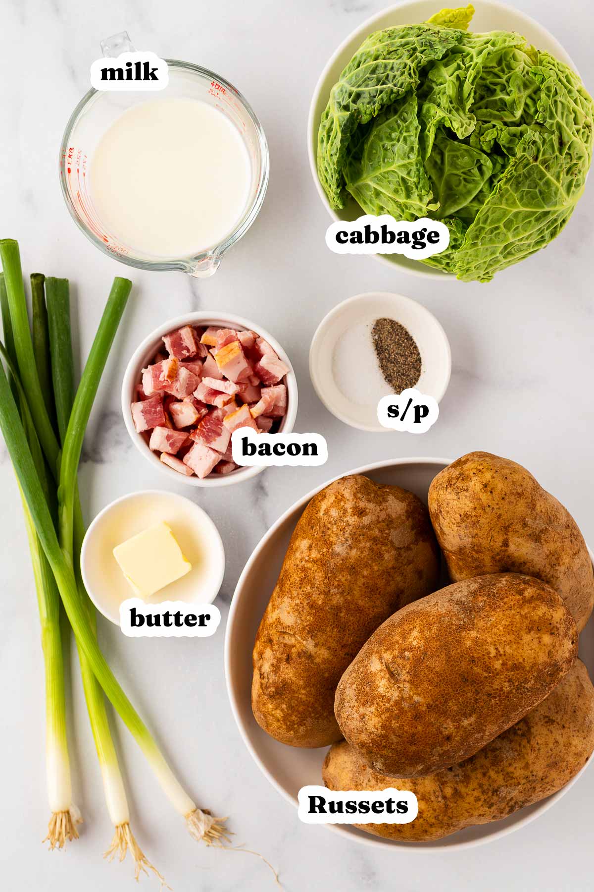 overhead view of ingredients to make colcannon with text labels