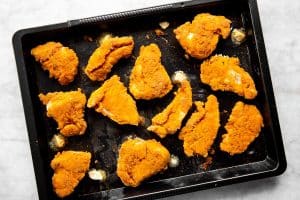 https://www.savorynothings.com/wp-content/uploads/2021/03/oven-fried-chicken-image-step-9-300x200.jpg
