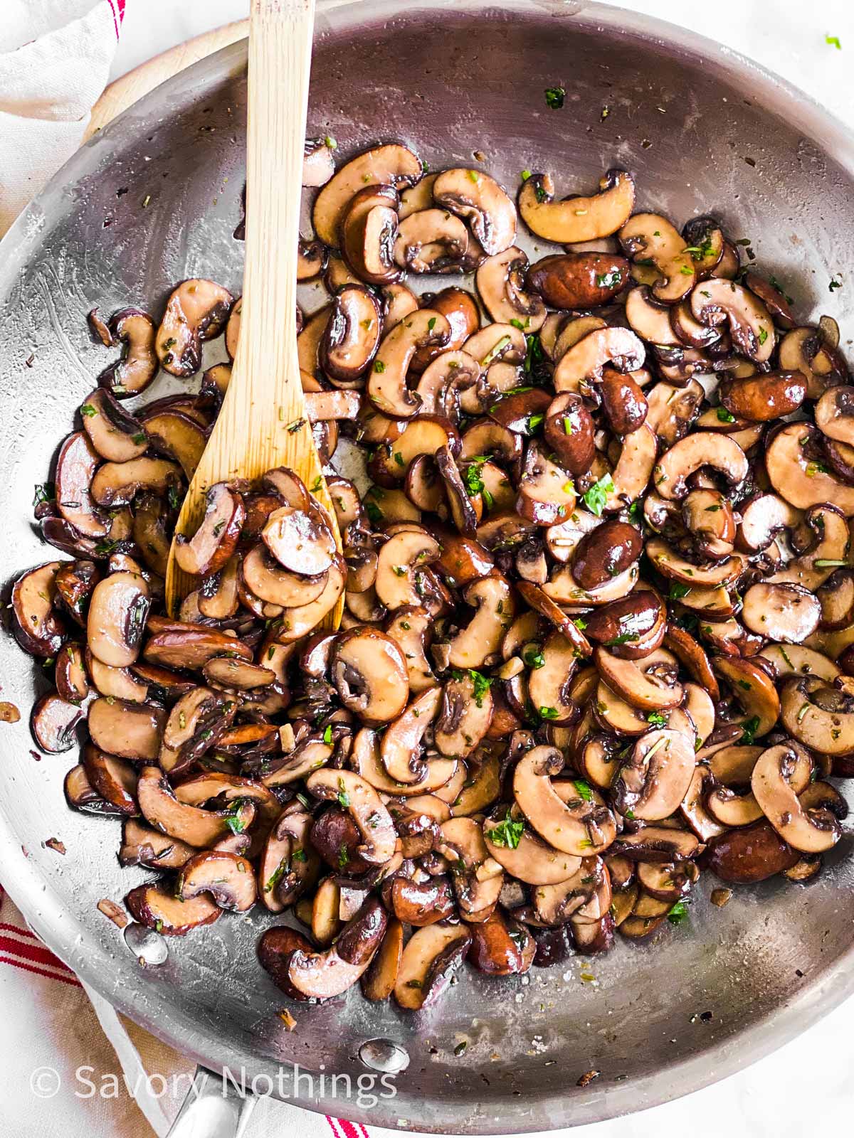 overhead view of sautéed mushrooms in skillet