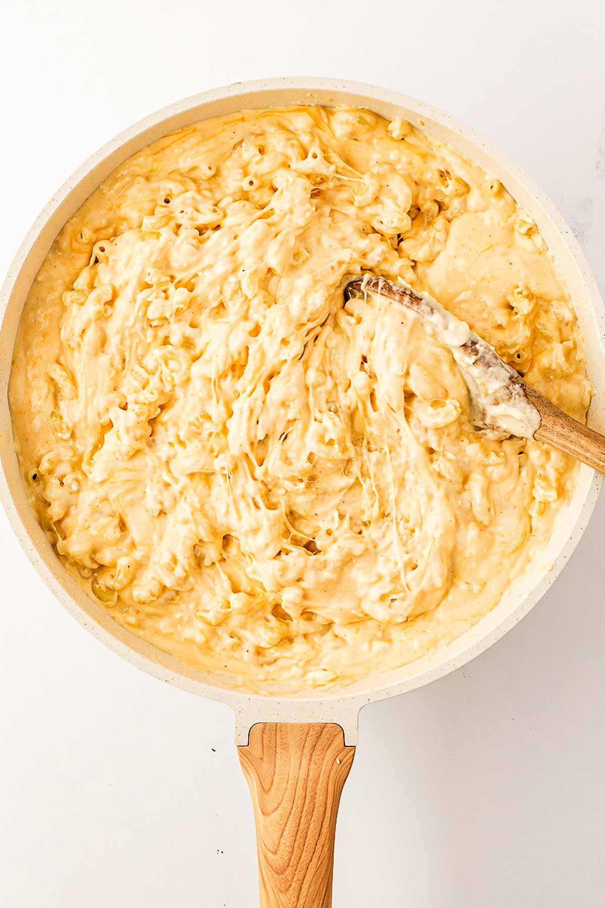 overhead view of macaroni and cheese sauce in skillet