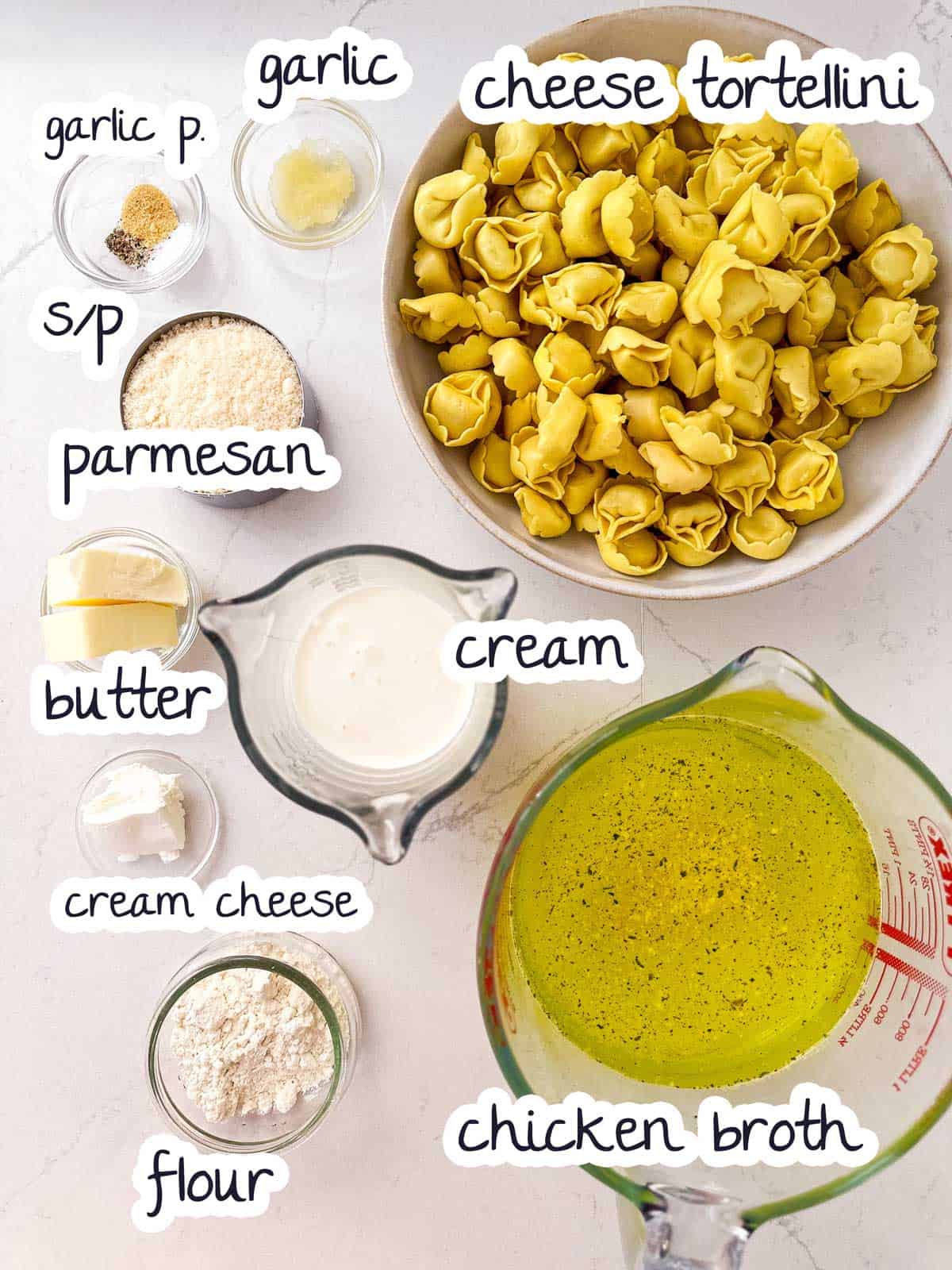 ingredients to make creamy cheese tortellini with text labels