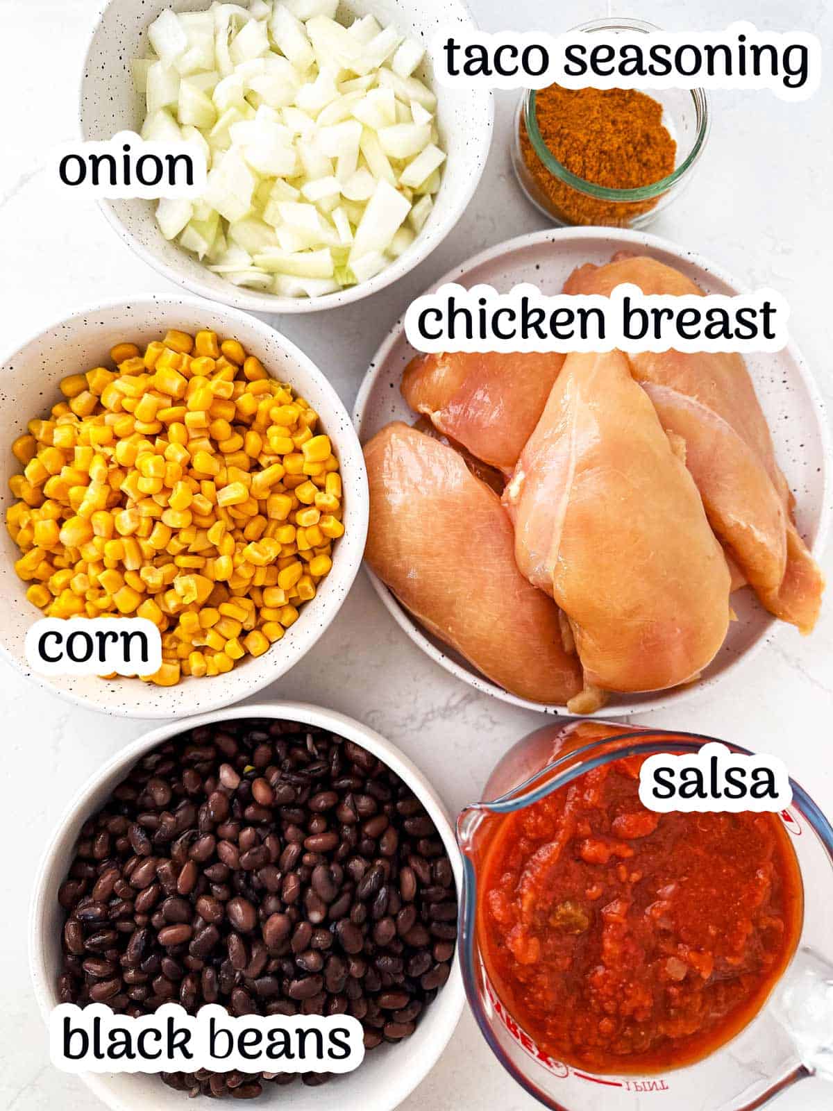 ingredients for crock pot chicken tacos with text labels