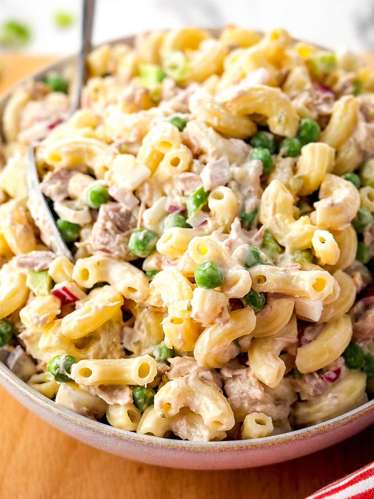 frontal view of bowl filled with tuna macaroni salad