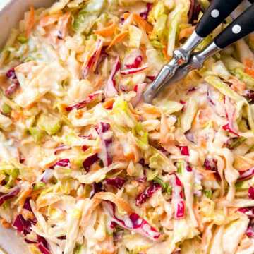 overhead view of white bowl filled with coleslaw