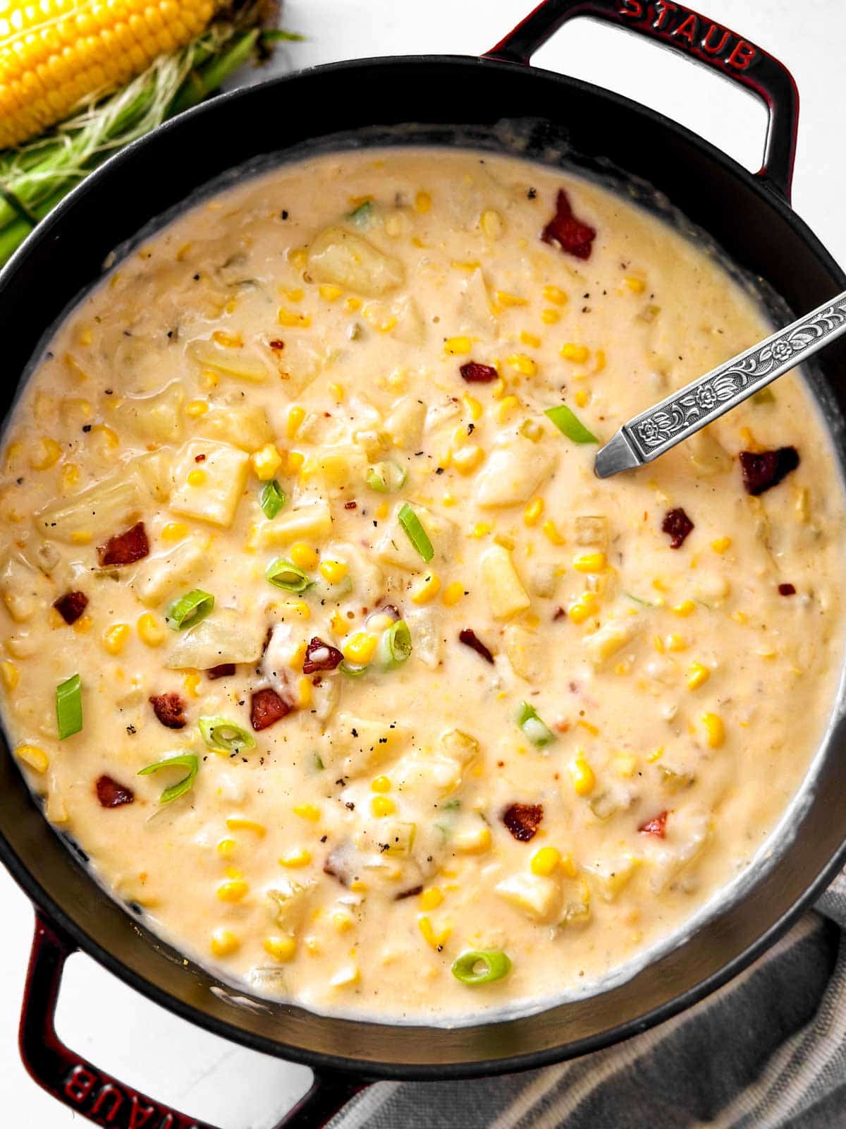 overhead view of corn chowder in Dutch oven