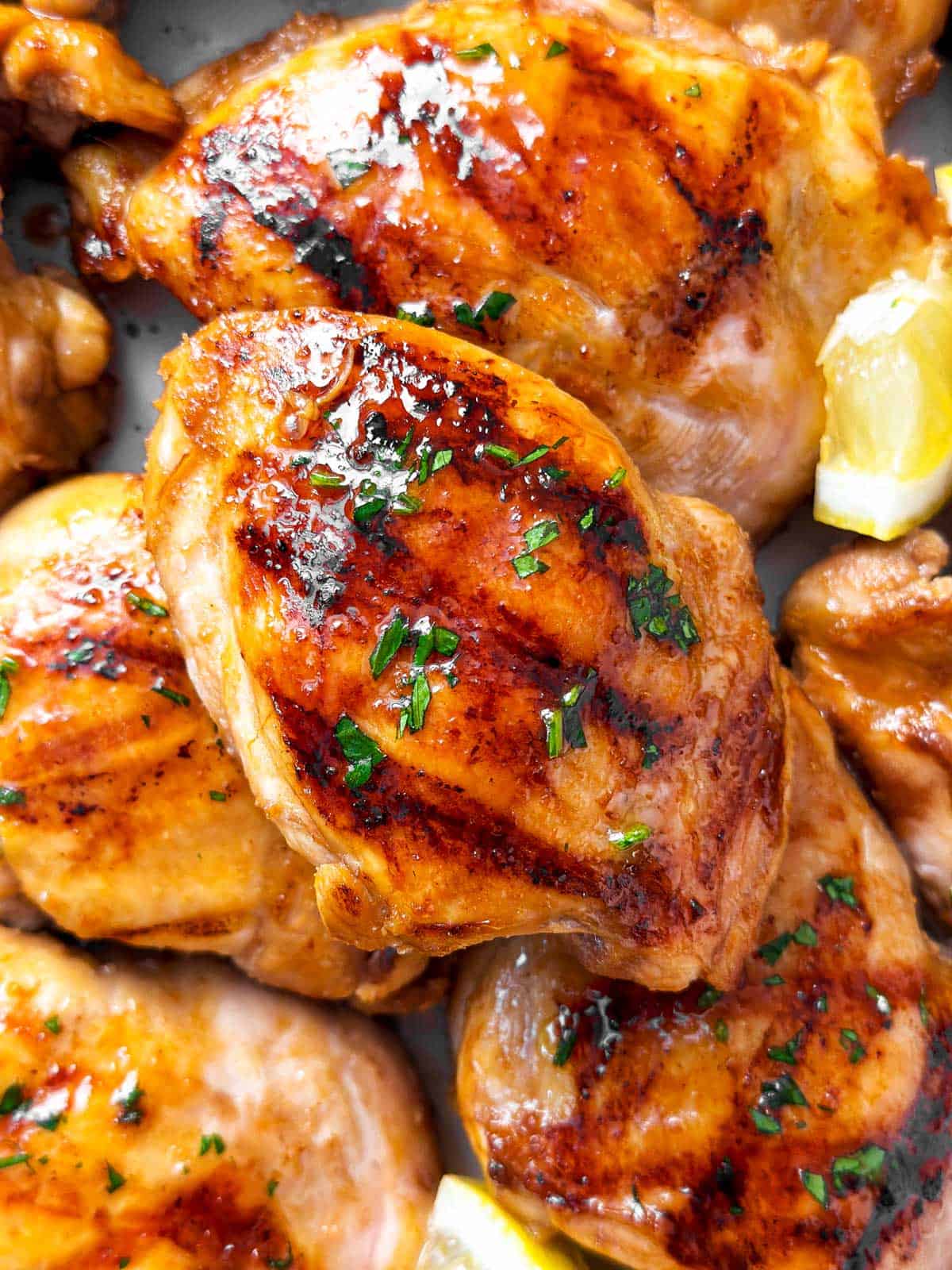 overhead close up view of grilled chicken thighs