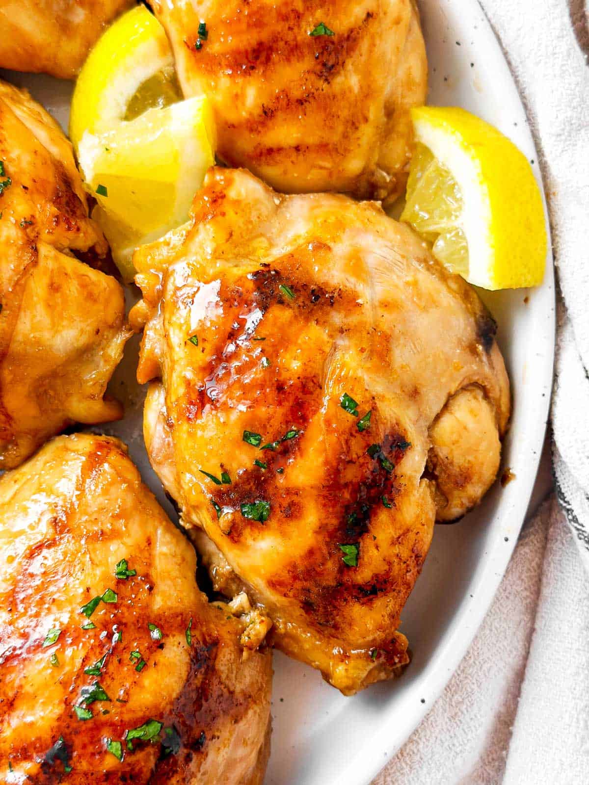 overhead close up view of grilled chicken thigh