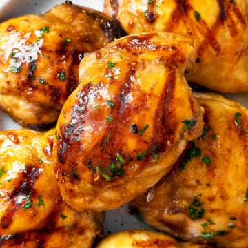 overhead close up view of grilled chicken thighs