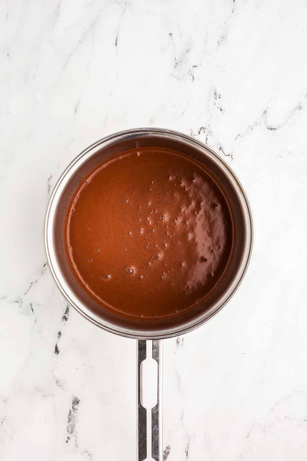 overhead view of cocoa milk mix in saucepan