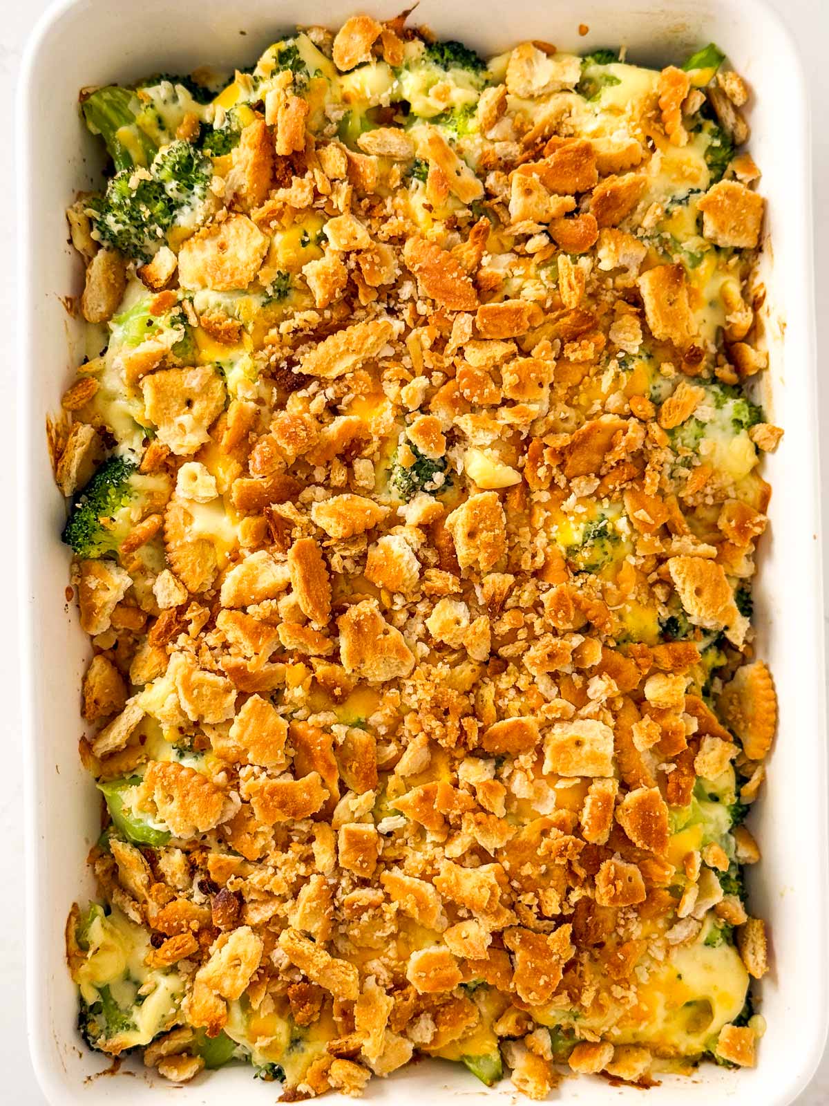 overhead view of baked broccoli cheese casserole