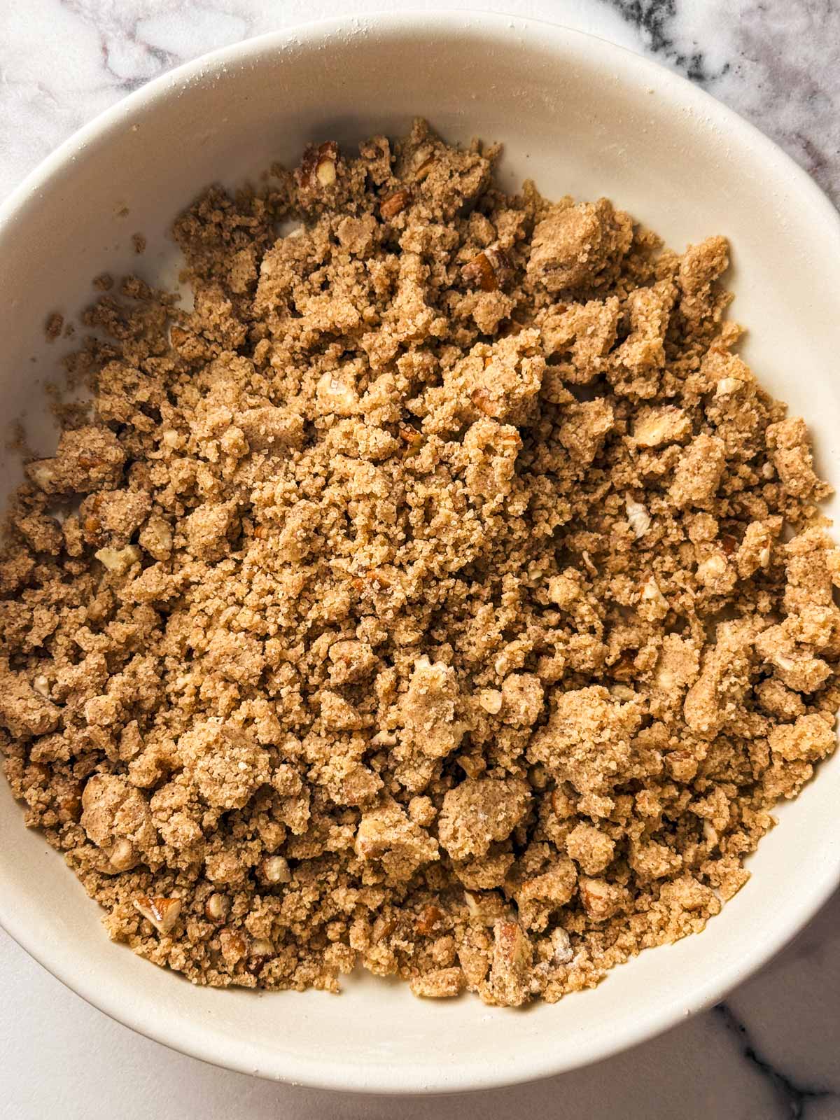 overhead view of bowl filled with streusel