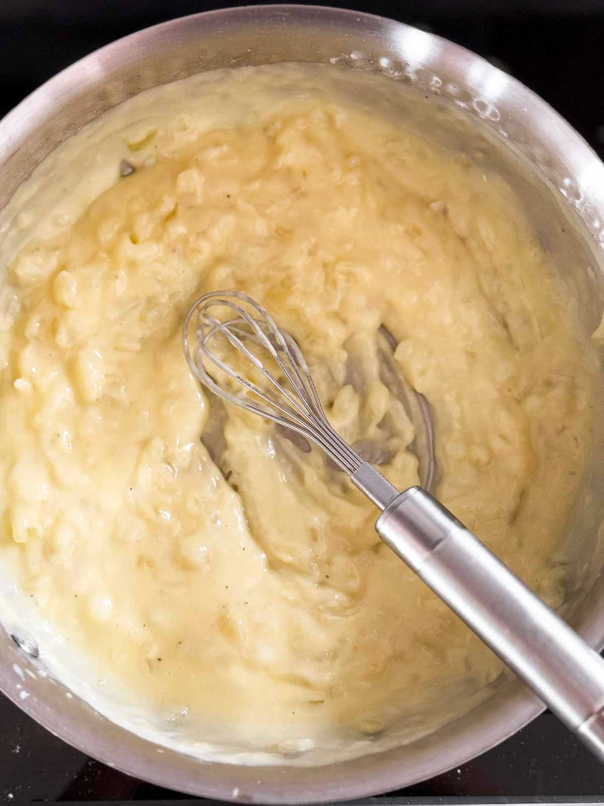 overhead view of béchamel in saucepan