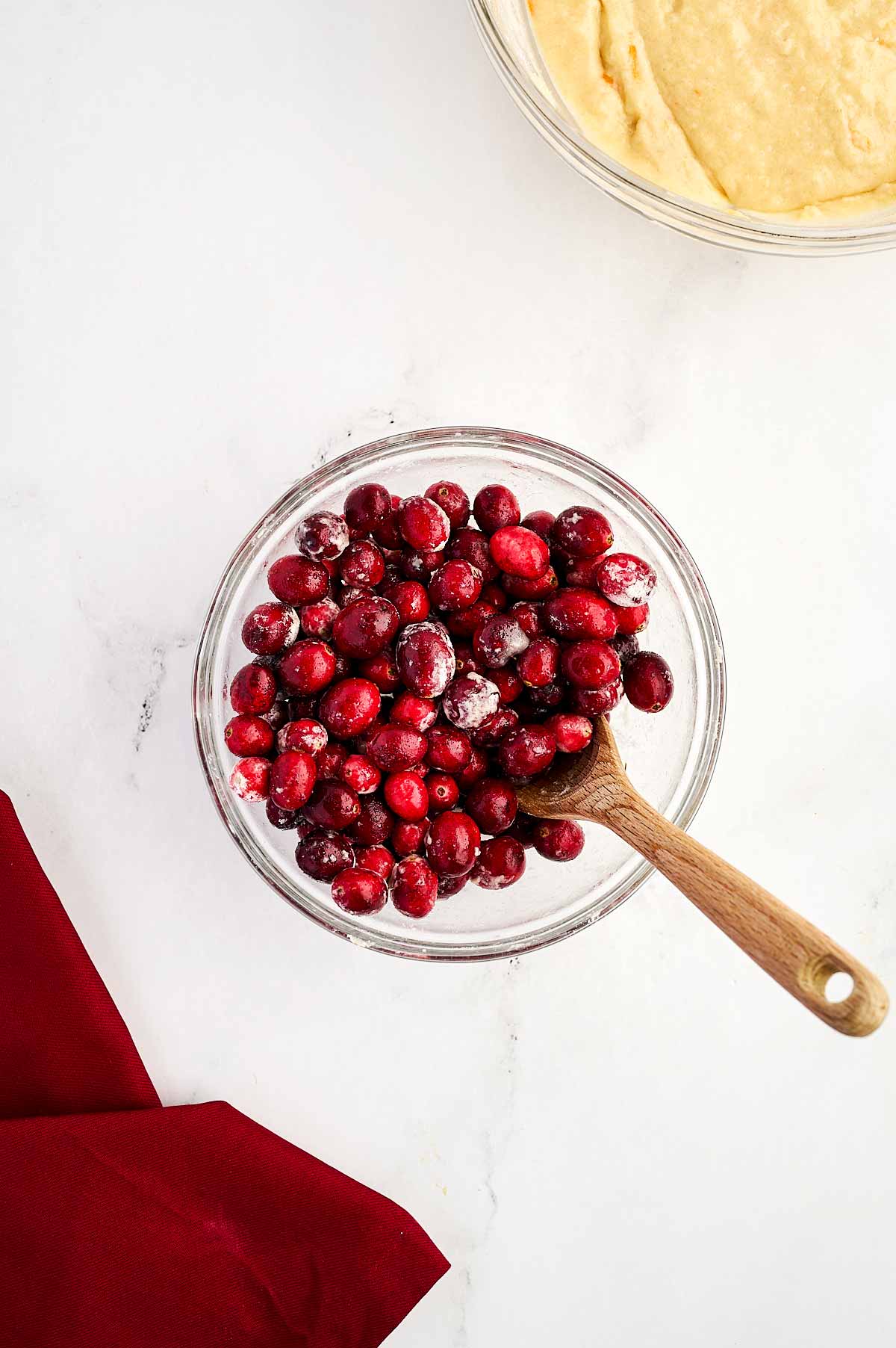 overhead view of cranberries tossed with flour