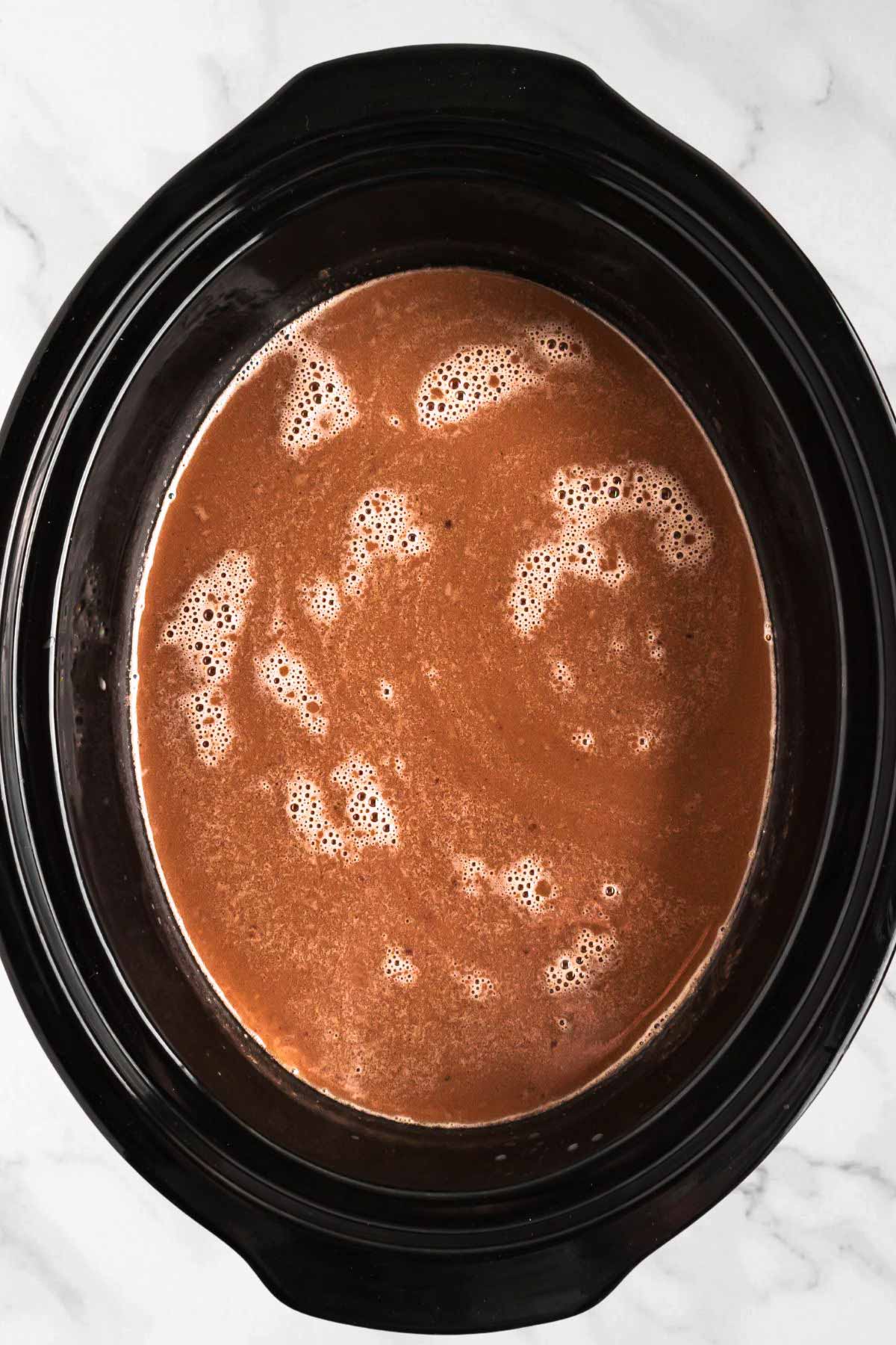 overhead view of hot chocolate in slow cooker