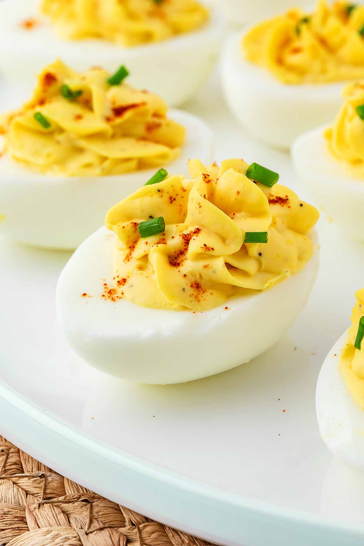 frontal view of deviled eggs on white plate