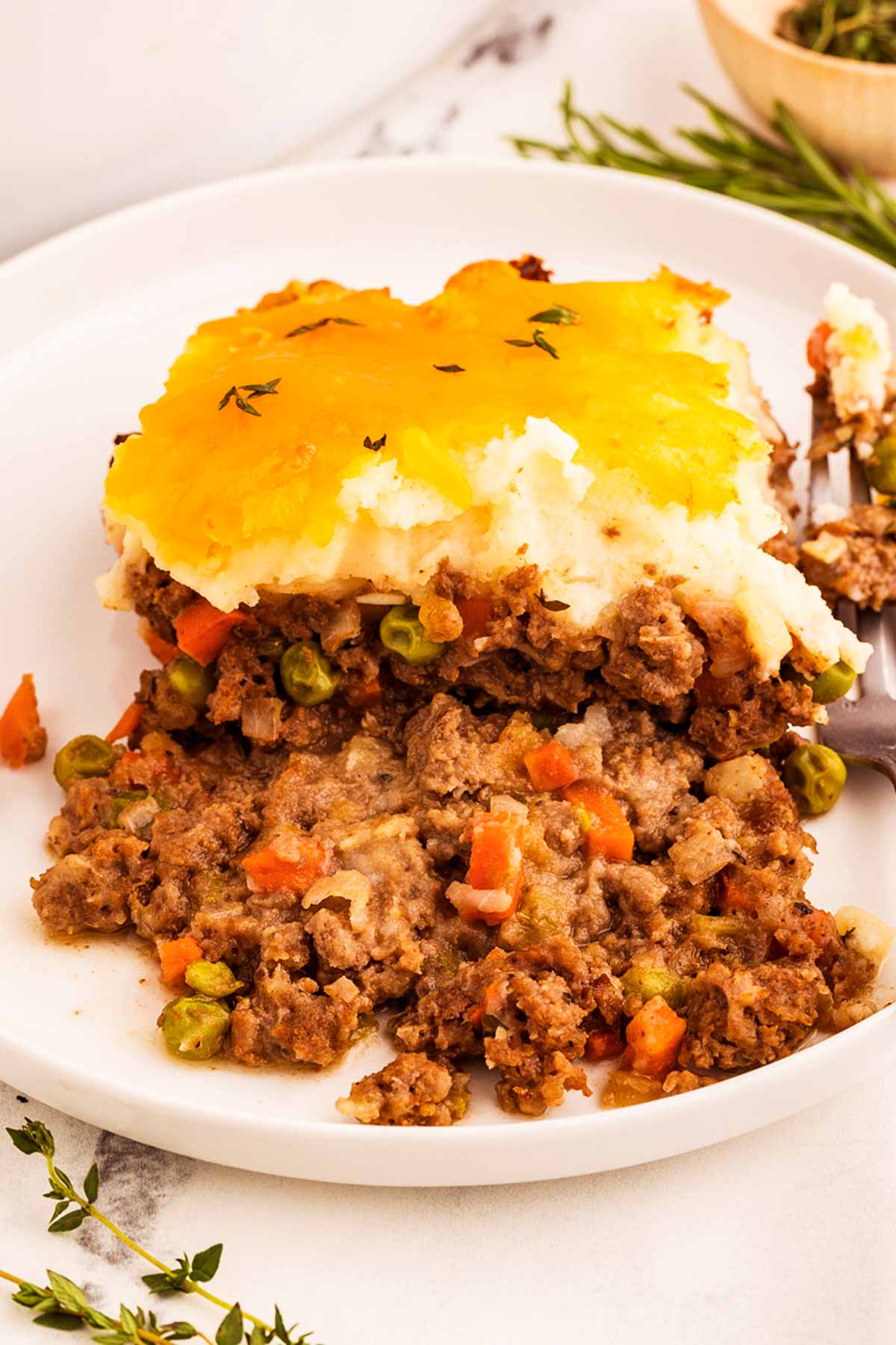 frontal view of shepherd's pie on white plate