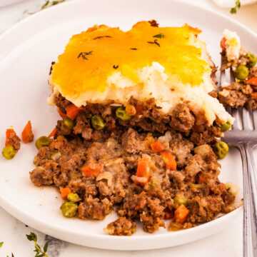 frontal view of shepherd's pie on white plate