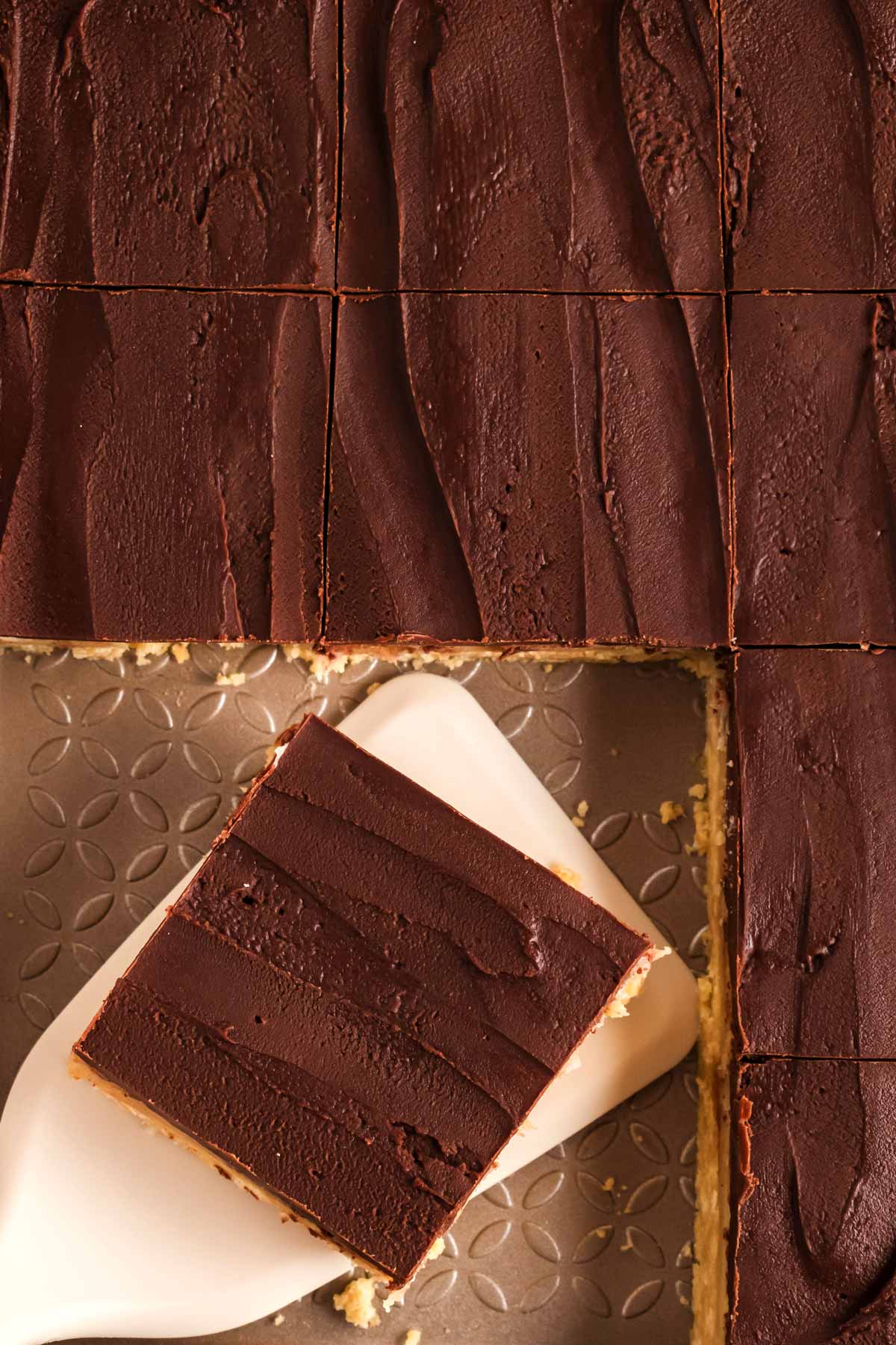 overhead view of millionaire's shortbread bar on spatula