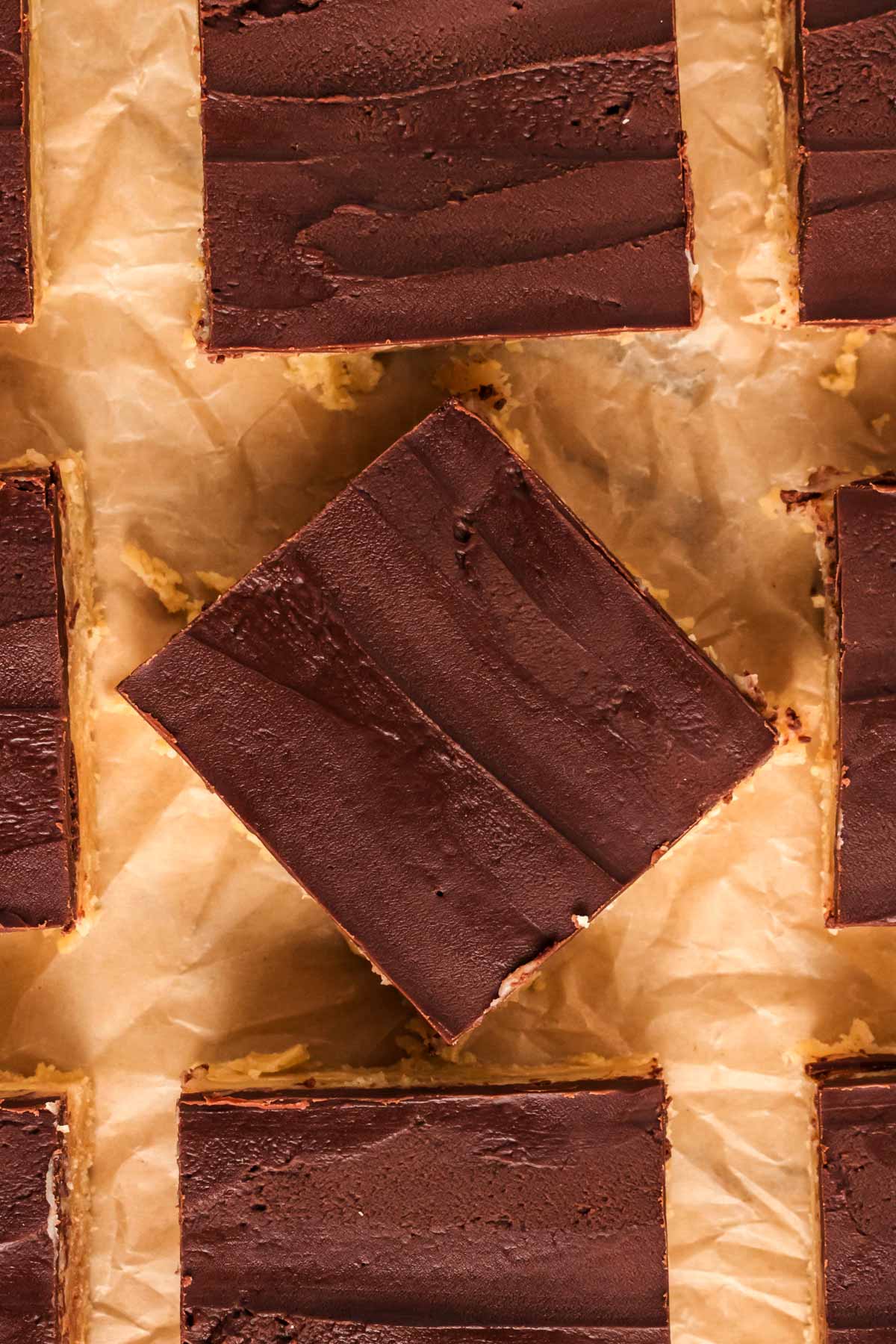 overhead view of millionaire's shortbread bars on baking parchment