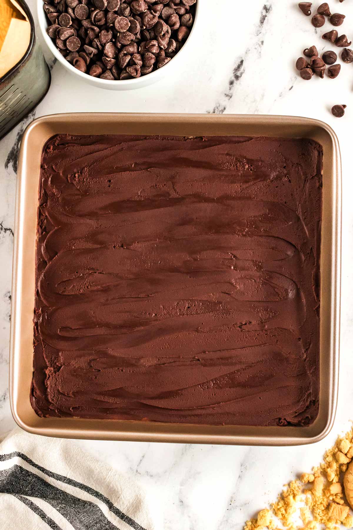 overhead view of millionaire's shortbread bars in square baking pan