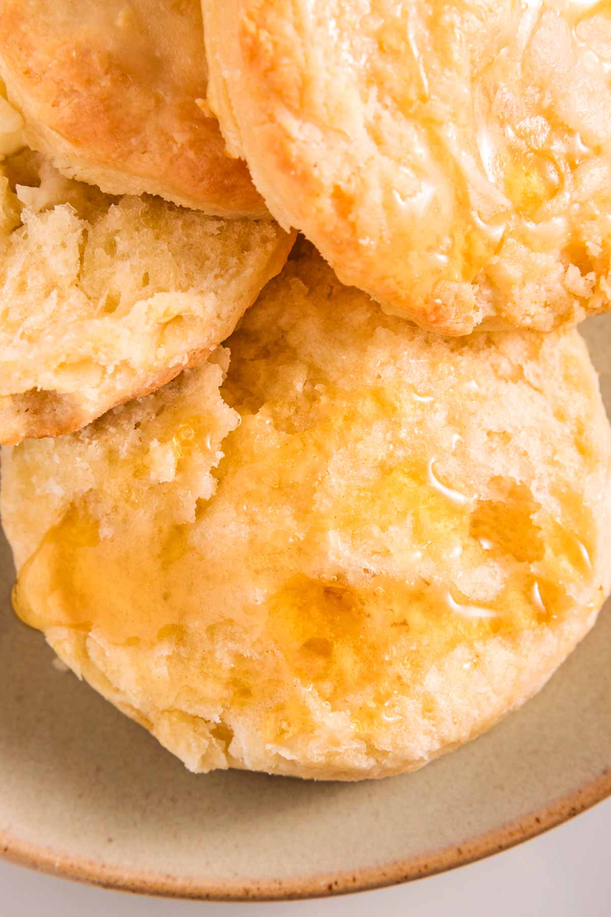 overhead view of split biscuits on plate