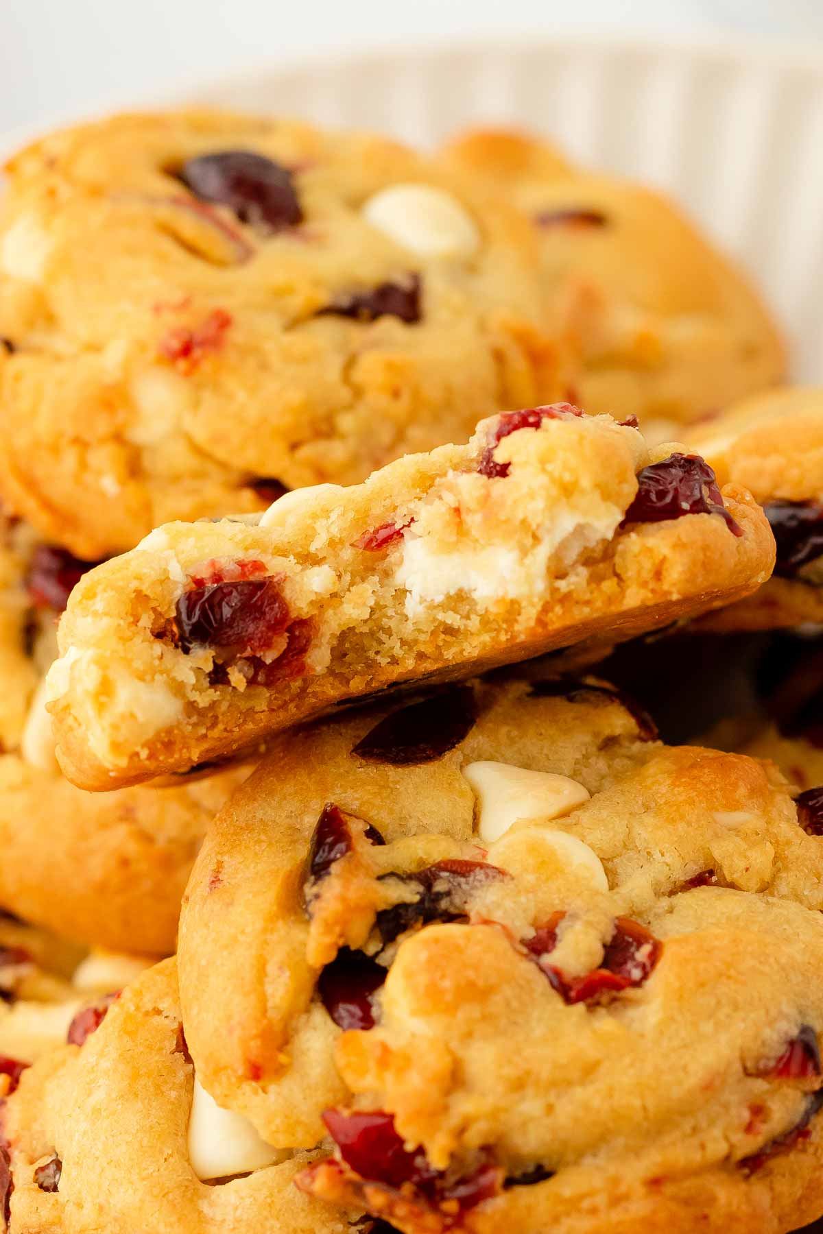 overhead view of halved cranberry white chocolate chip cookie