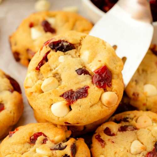 frontal view of cranberry white chocolate chip cookie on spatula