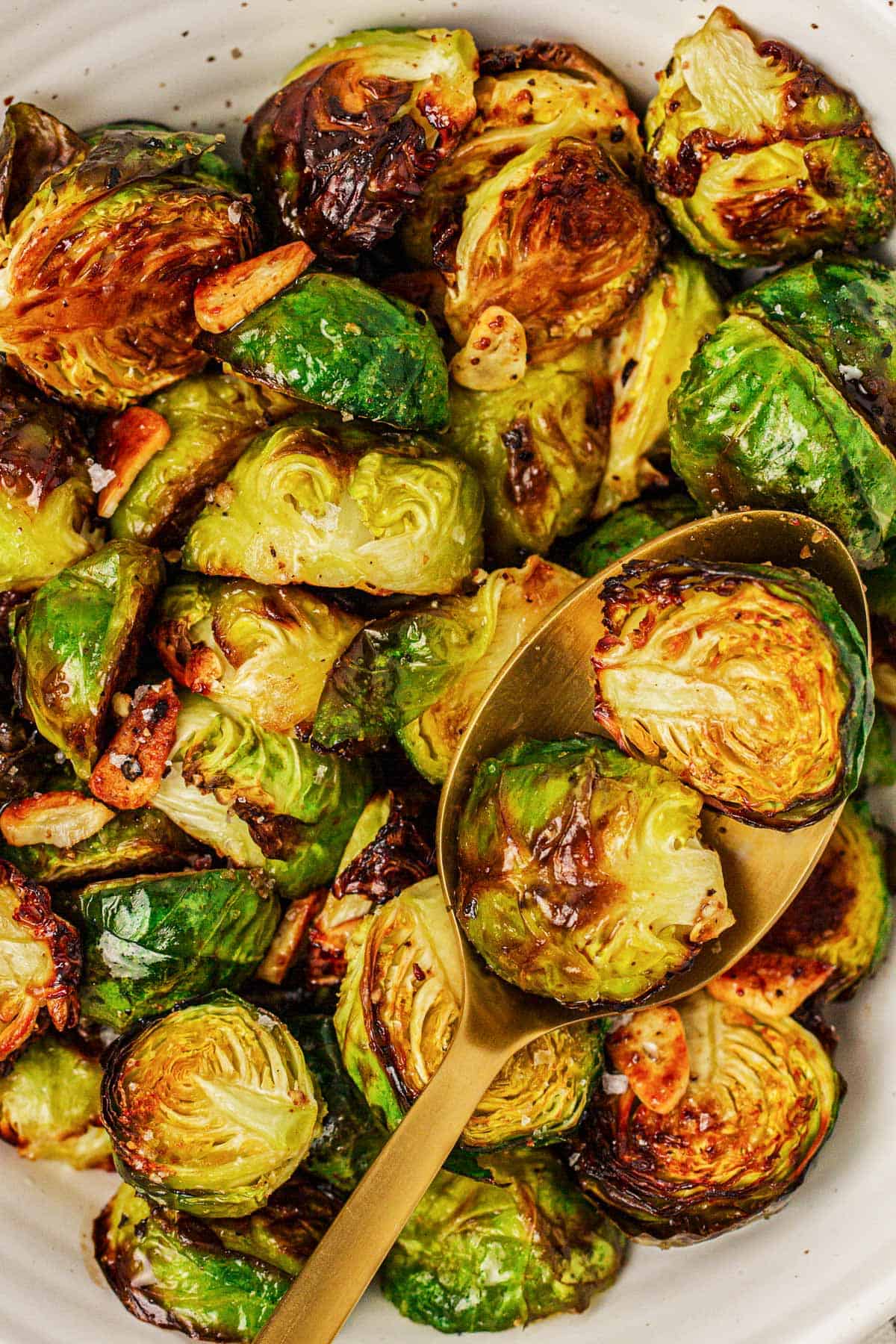 overhead close up view of roasted Brussels sprouts in a bowl