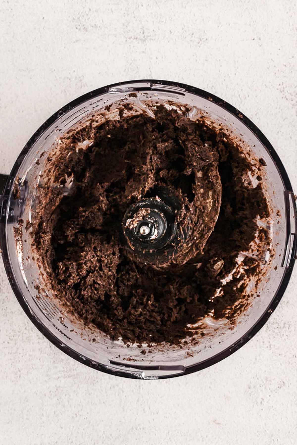 overhead view of Oreo truffle mix in food processor bowl