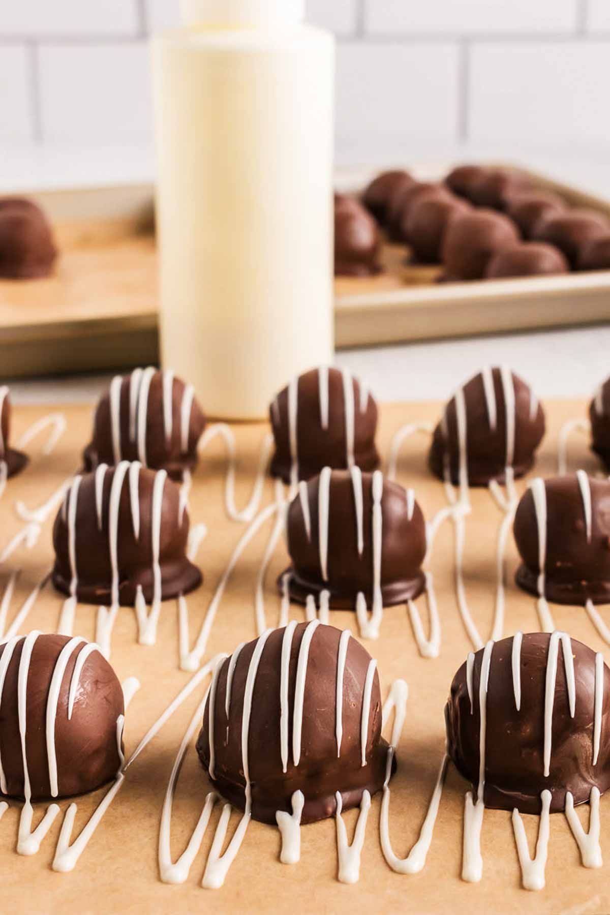 frontal view of oreo balls drizzled with white chocolate