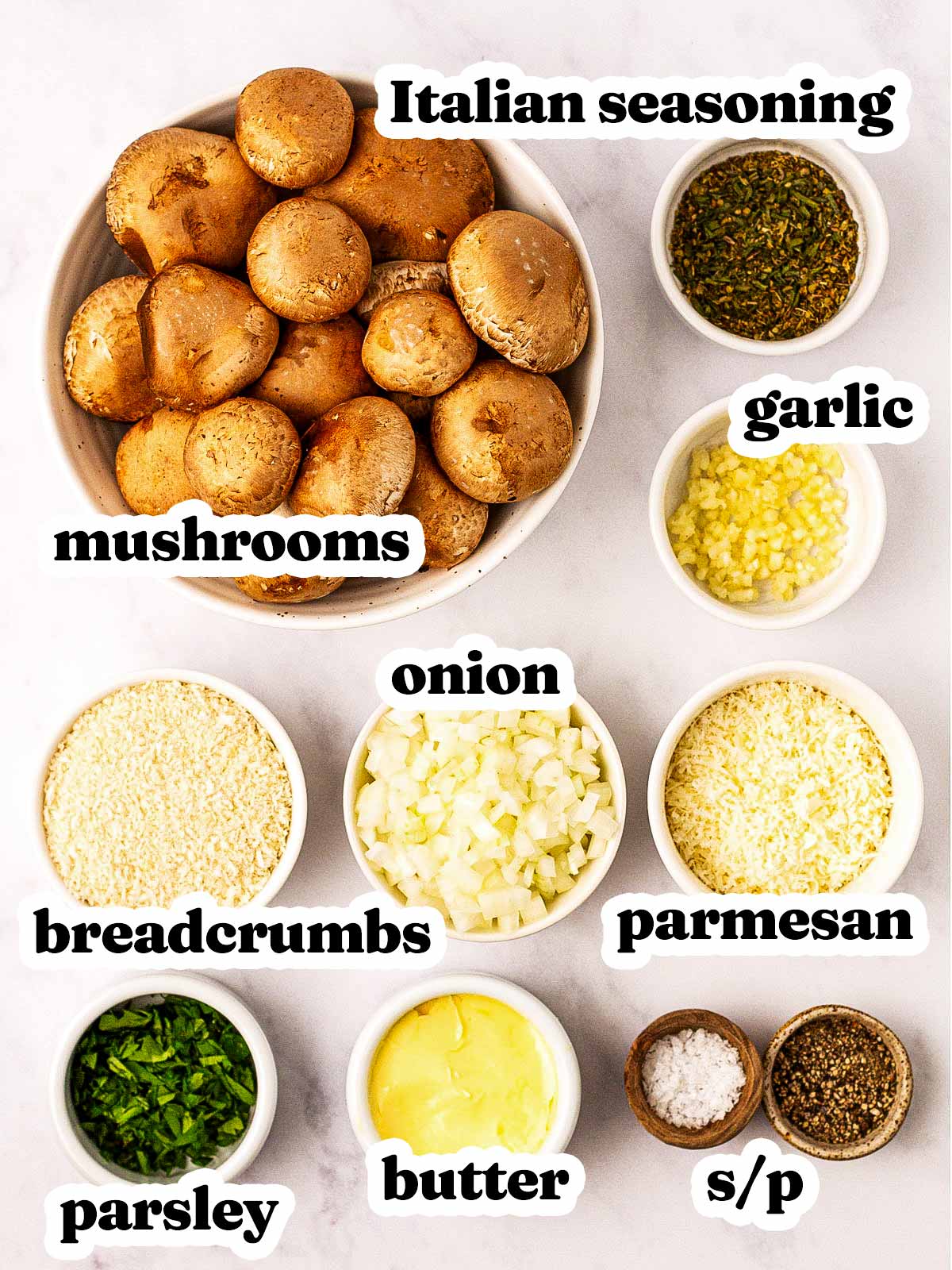 overhead view of ingredients to make stuffed mushrooms with text labels