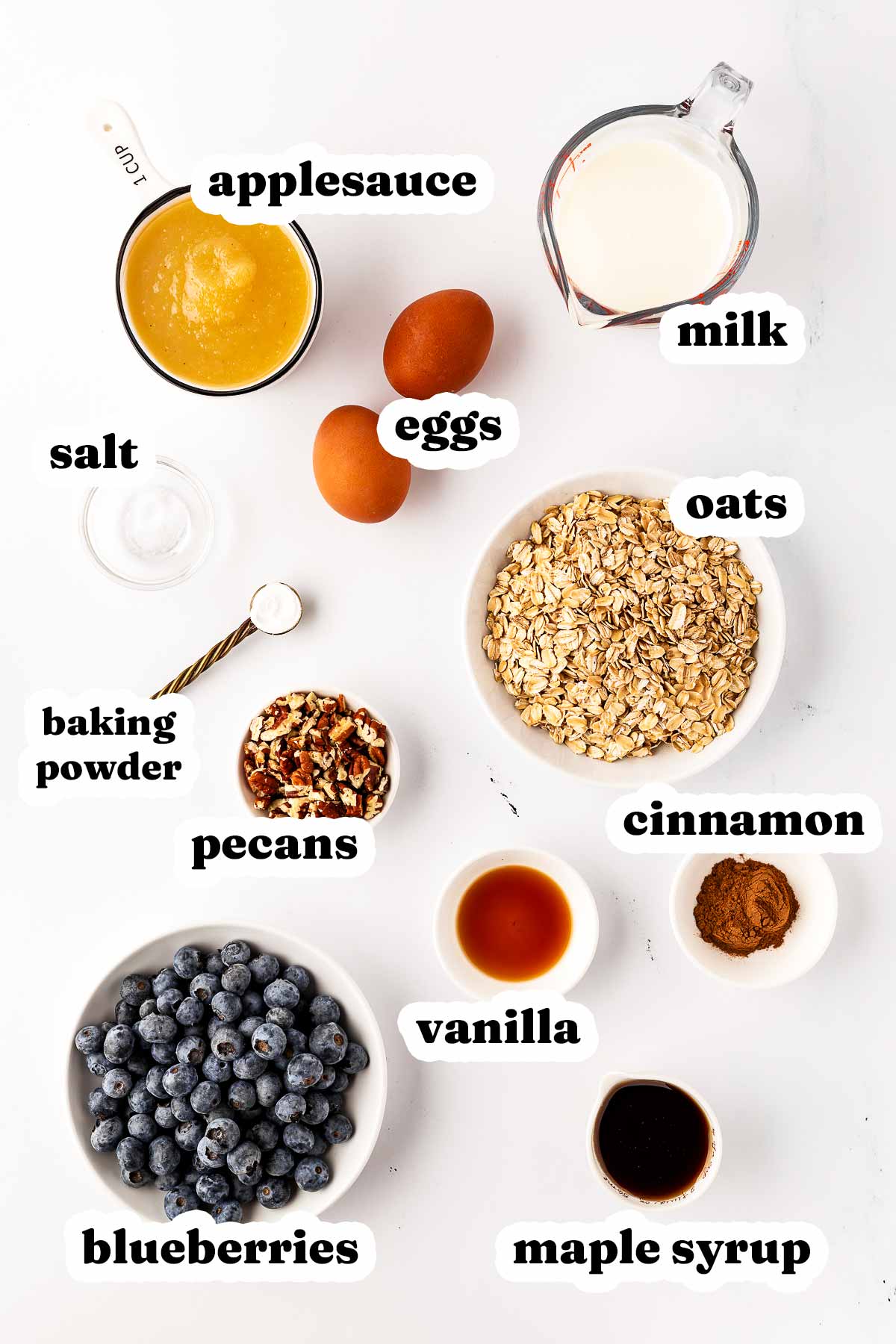 overhead view of ingredients to make blueberry baked oatmeal with text labels