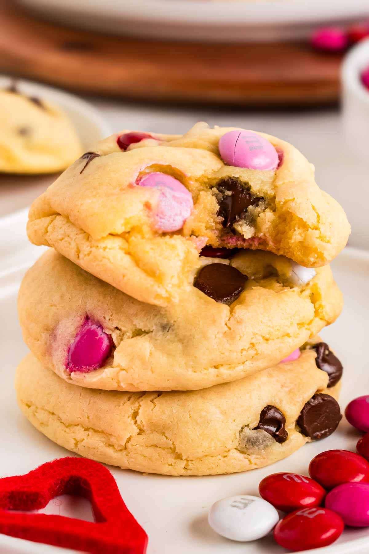 frontal view of stacked valentines day cookies