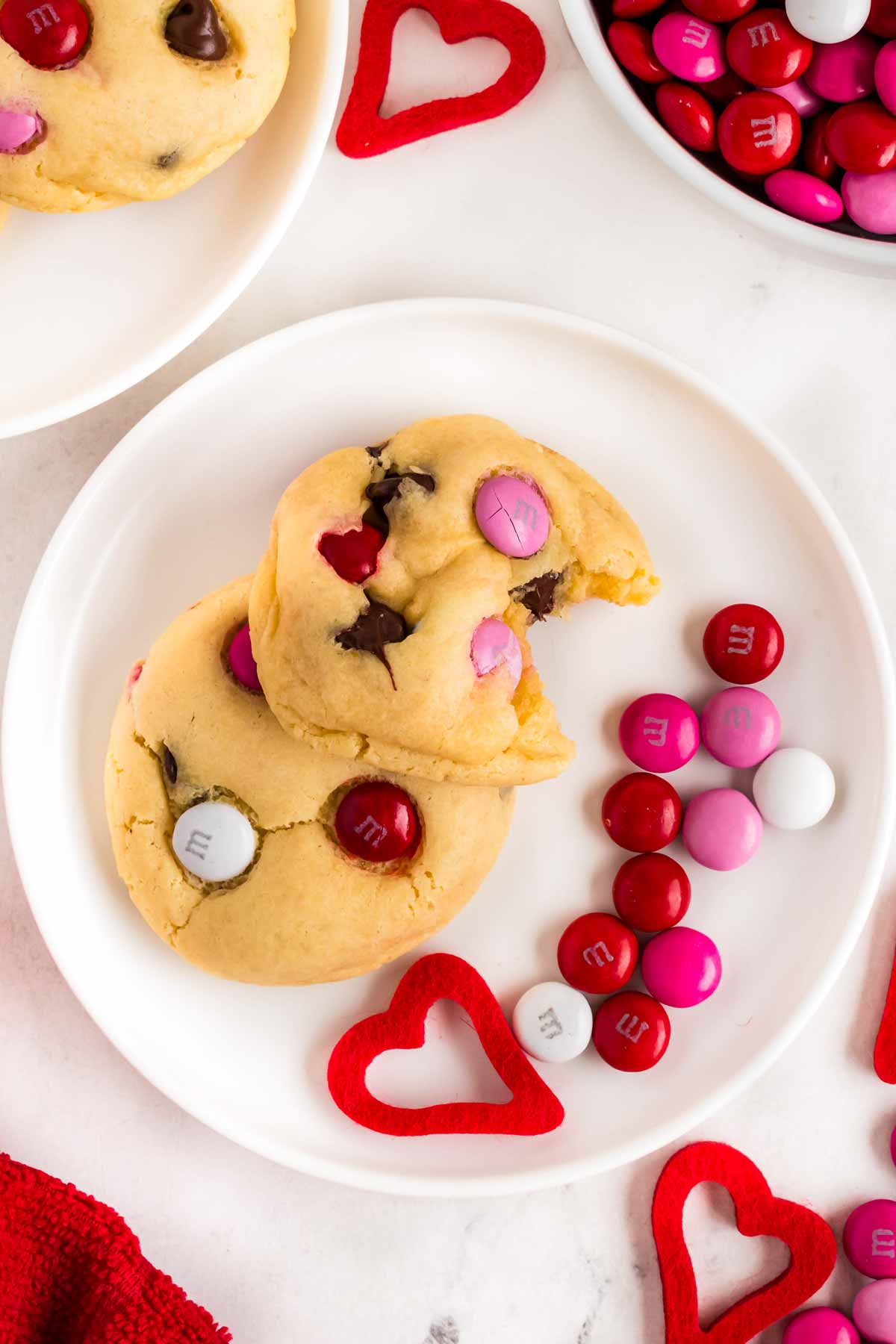 overhead view of cake mix cookies on plate with m&ms