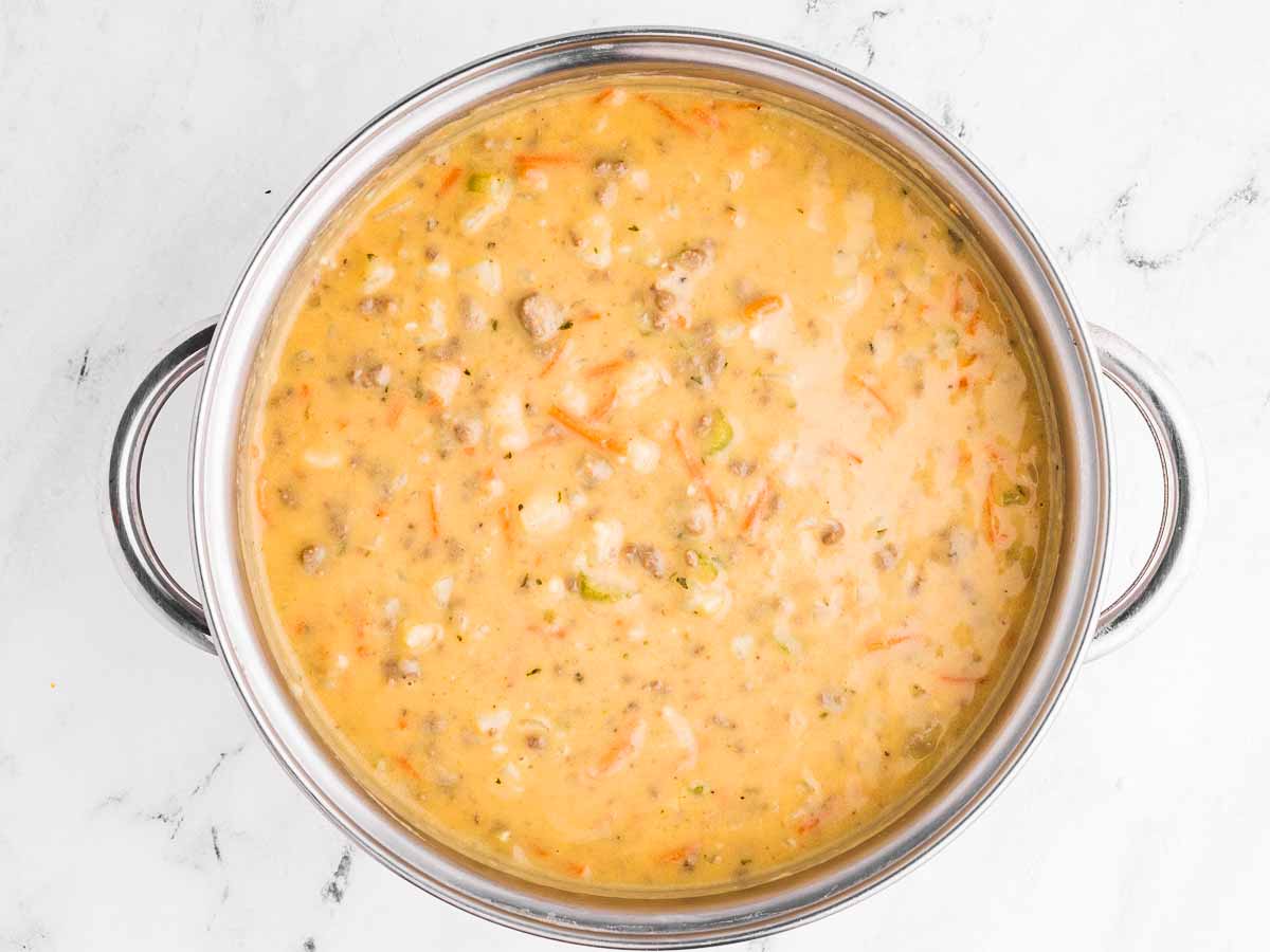 overhead view of cheeseburger soup in pot