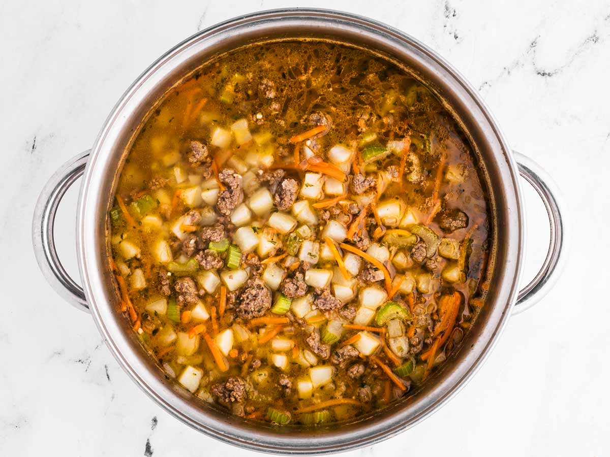 overhead view of cooked soup in pot